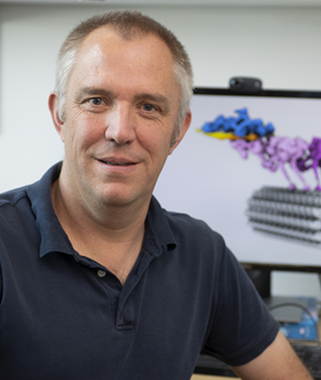 Portrait photograph of Andrew Carter